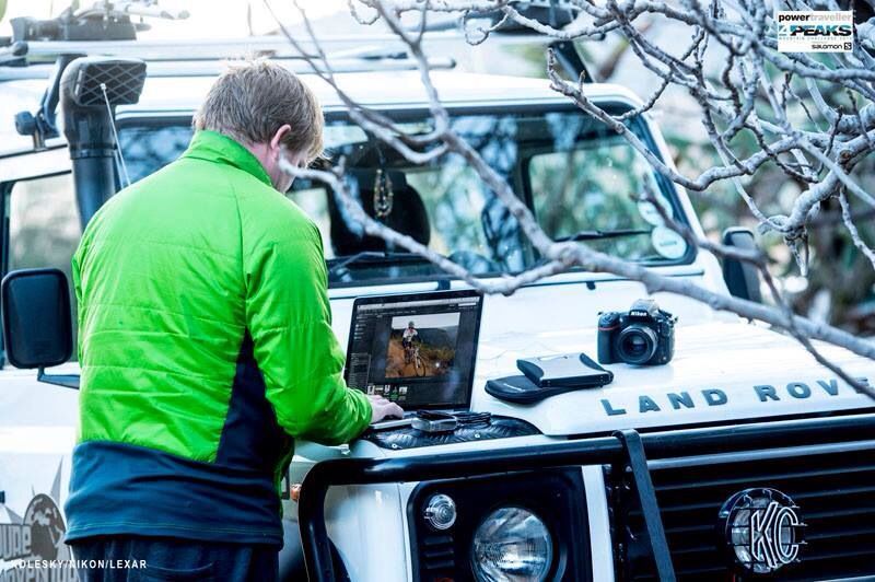 land rover and person with laptop